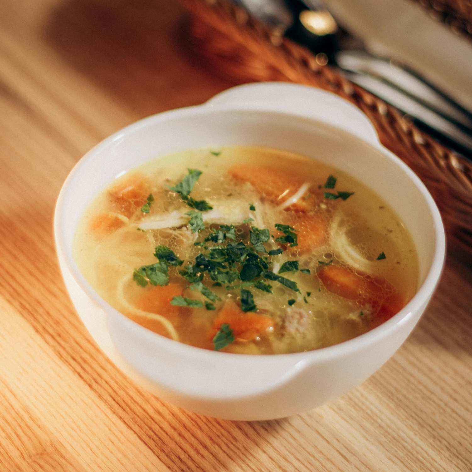 Homemade gut-healing bone broth in a ceramic mug for menopause relief